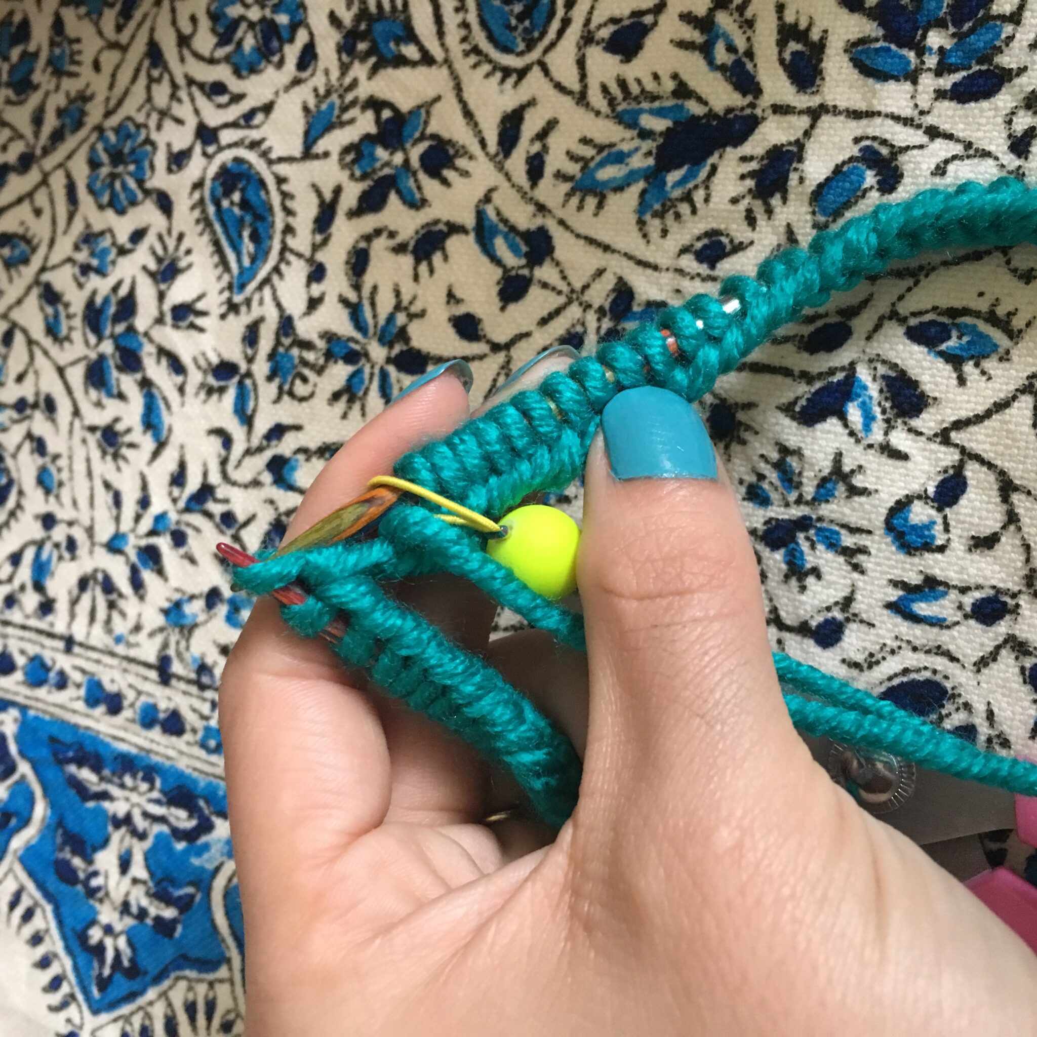 Return the slipped stitch to the left needle