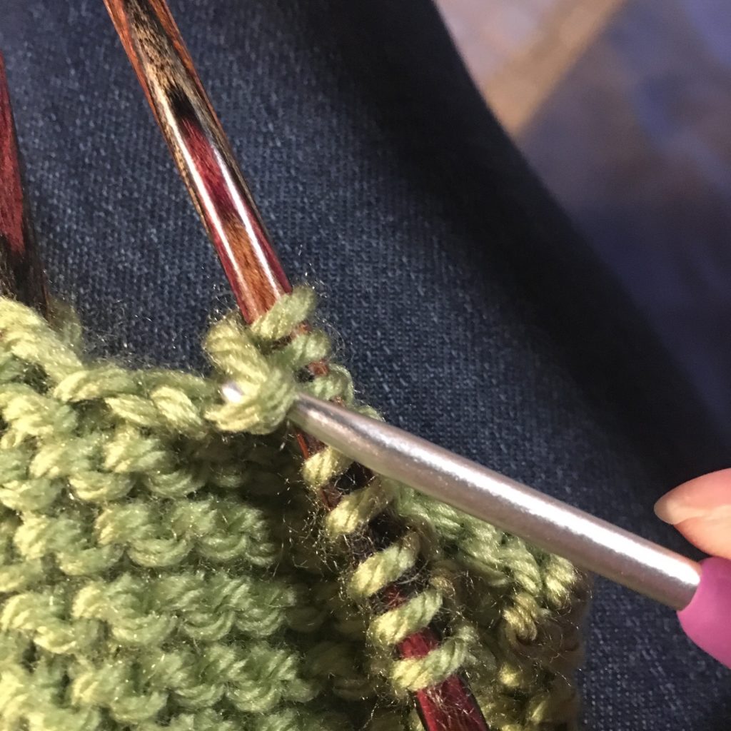 Crocheting a dropped stitch back up in knitting