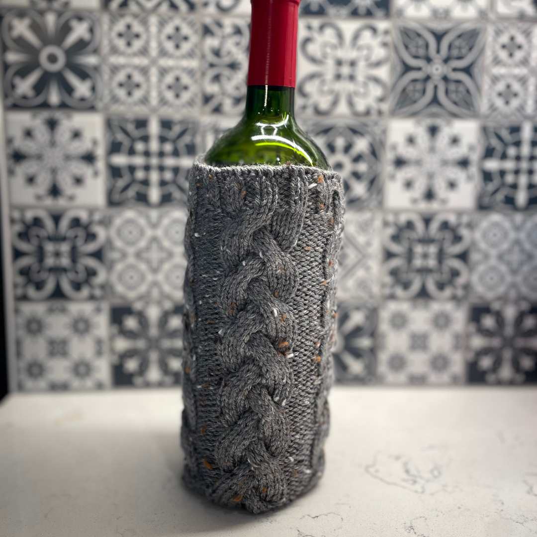 Braided Wine Bottle Sweater Knitting Pattern from Knitting in the Park. Knit the perfect hostess gift.