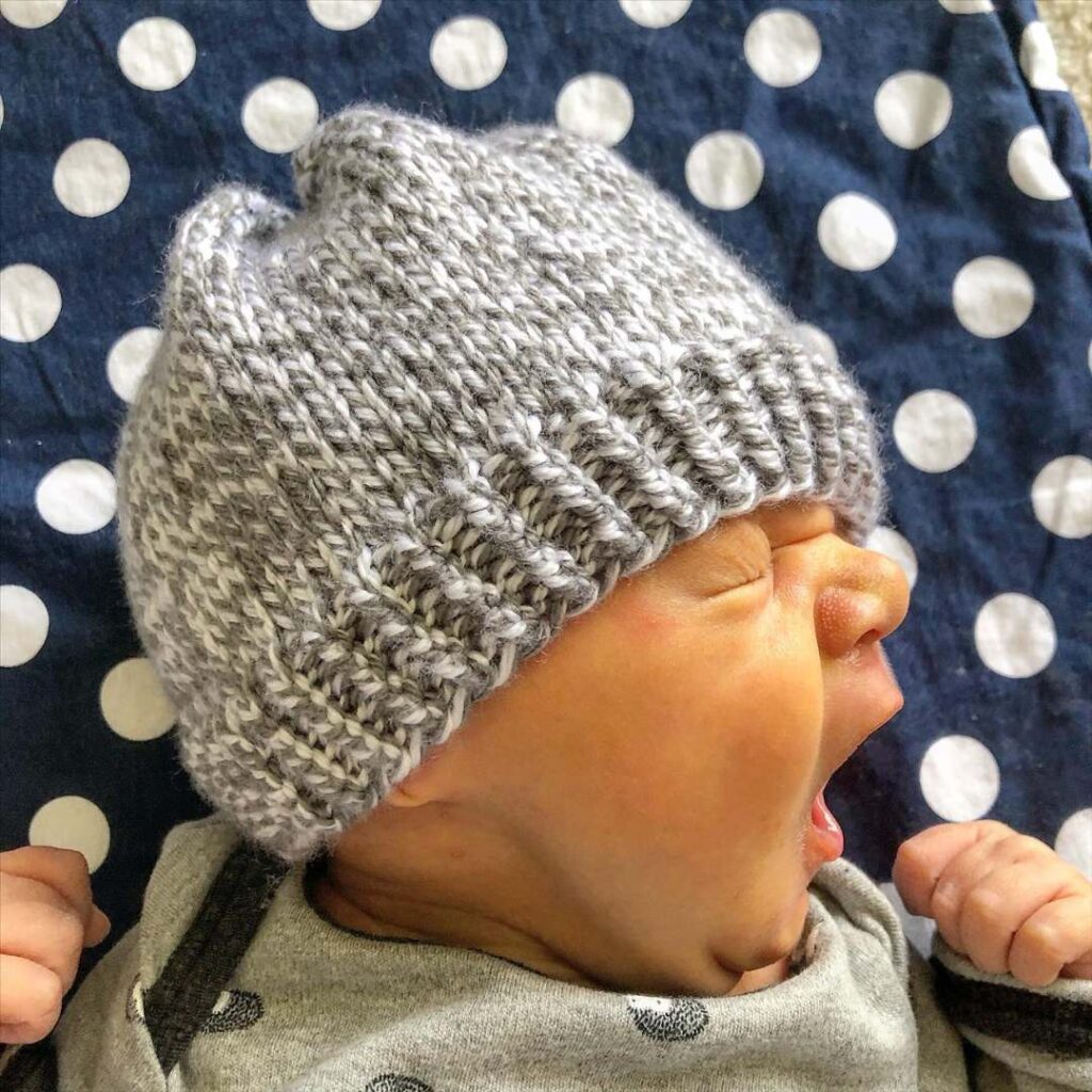 Learn how to knit a baby hat for free from Knitting in the Park.