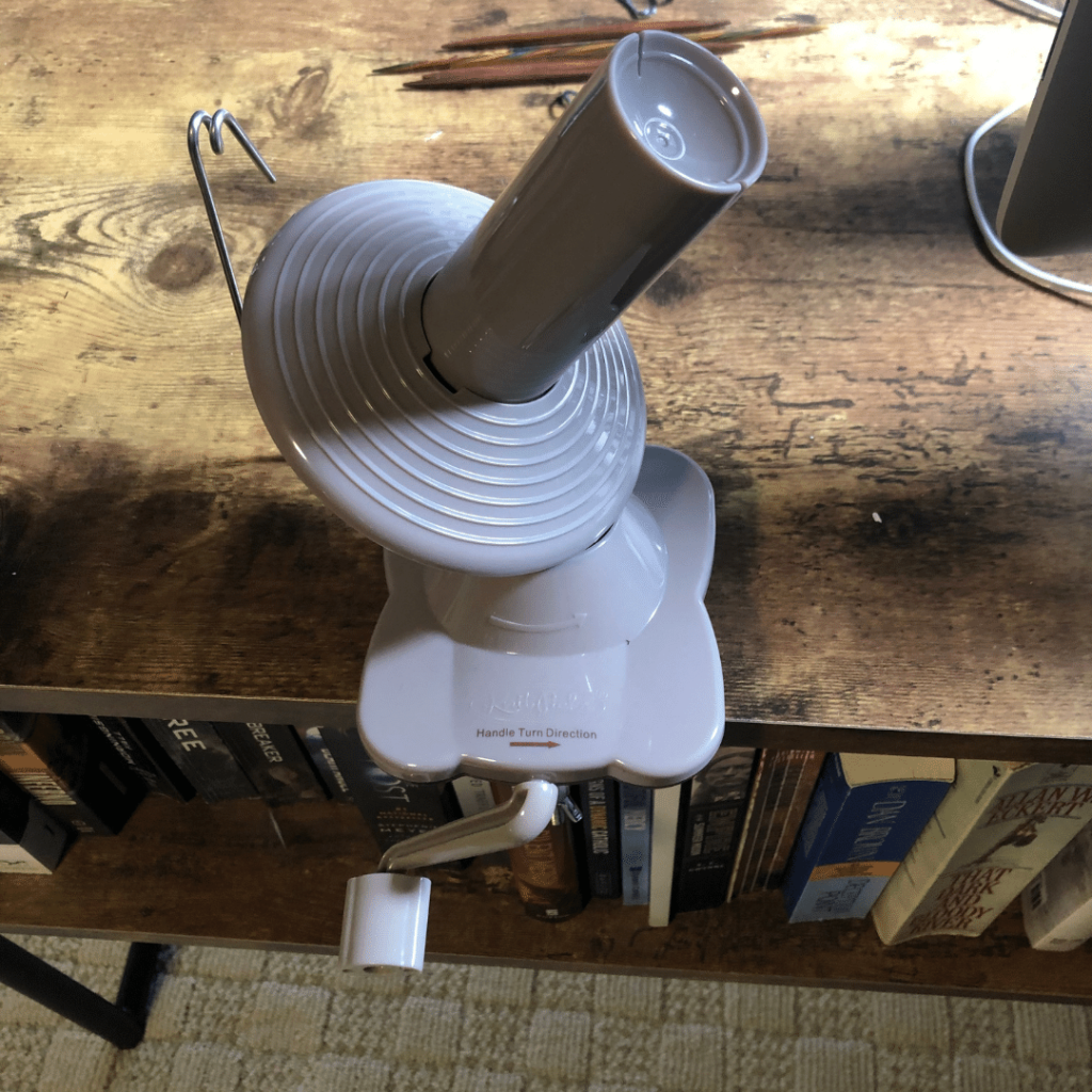 What is a yarn ball winder and how do you use it