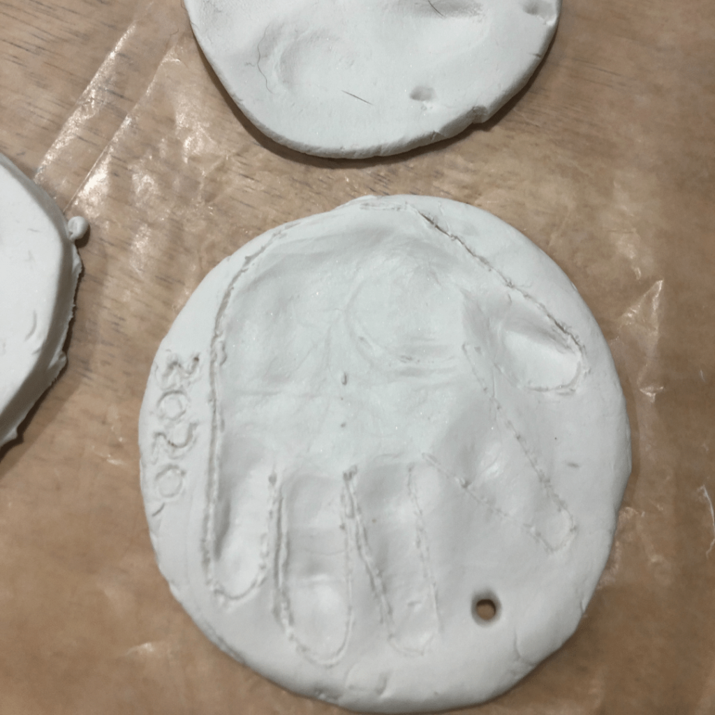 Drying Fynn and Murphy's Keepsake Handprint Christmas Ornaments 