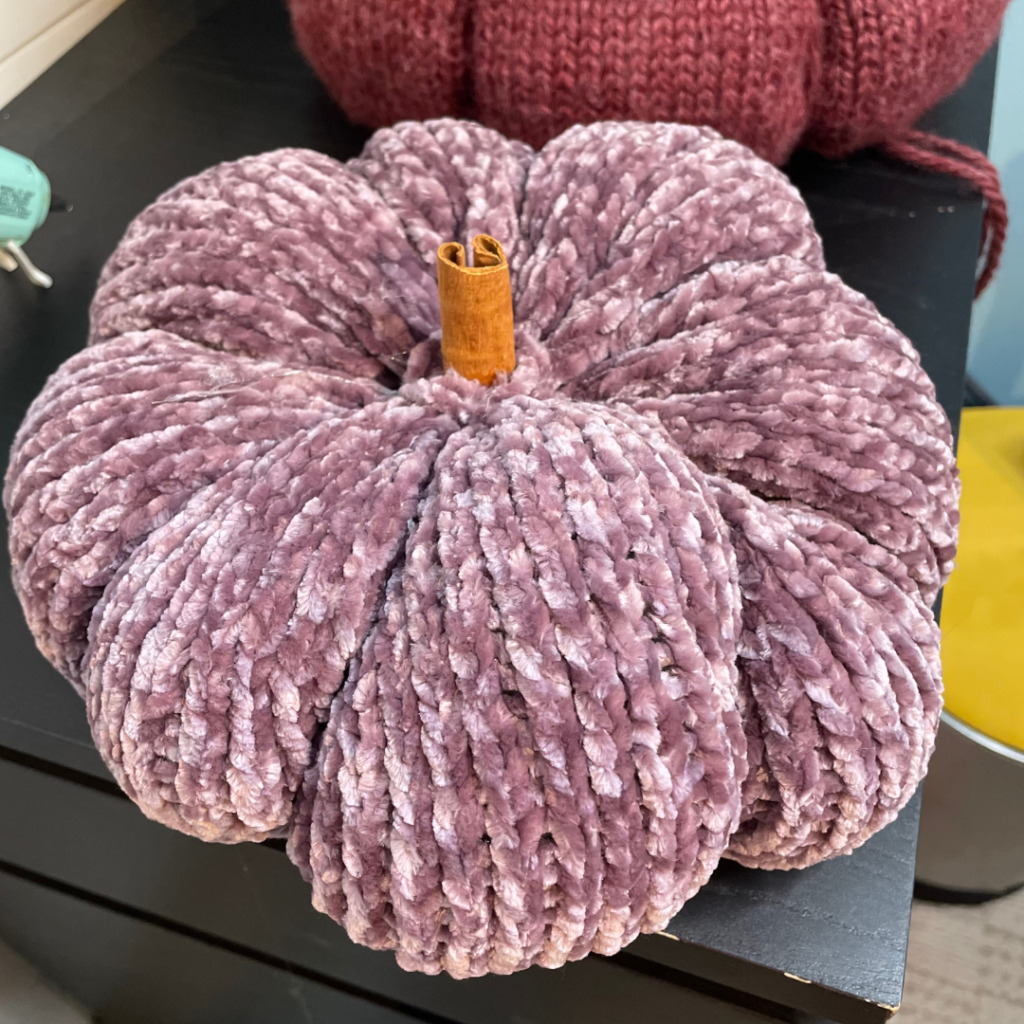 Knitting pumpkins in the park
