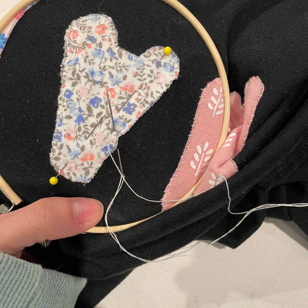 How I made a sweet mama embroidered sweatshirt out of those teeny newborn onesies I couldn't part with.