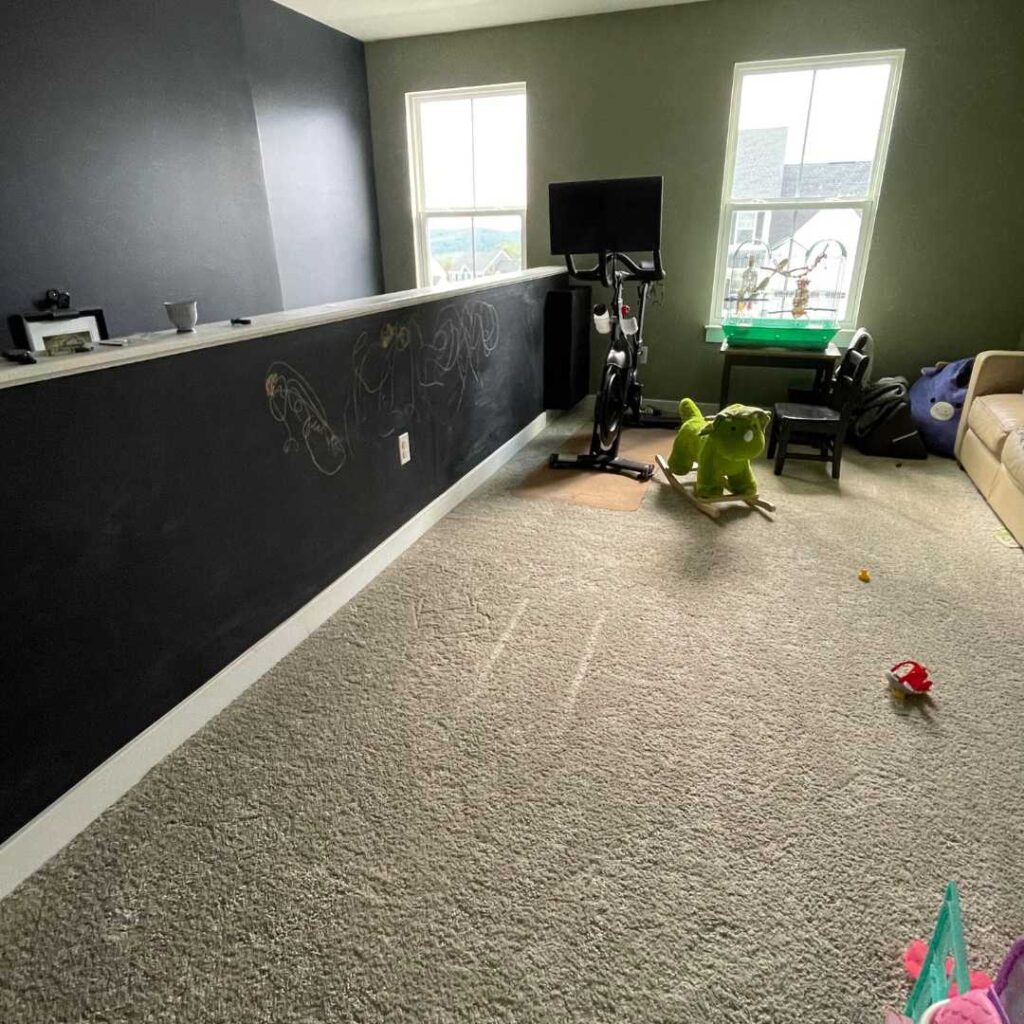 Chalkboard Paint wall opposite the DIY creative kids art display wall.