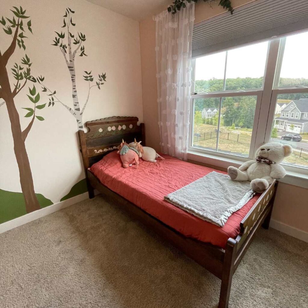 The big girl bed frame is finished and installed in her room!