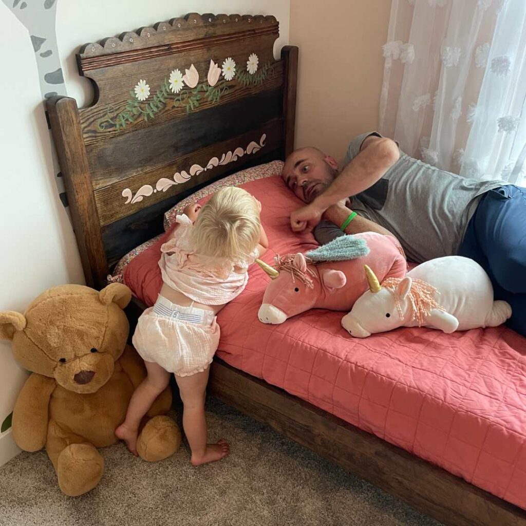 She loves each element of her hand painted big girl bed frame.