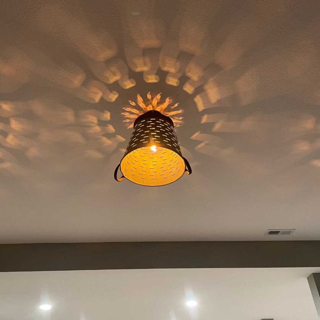 Transform olive picking baskets into the perfect pendant lights.