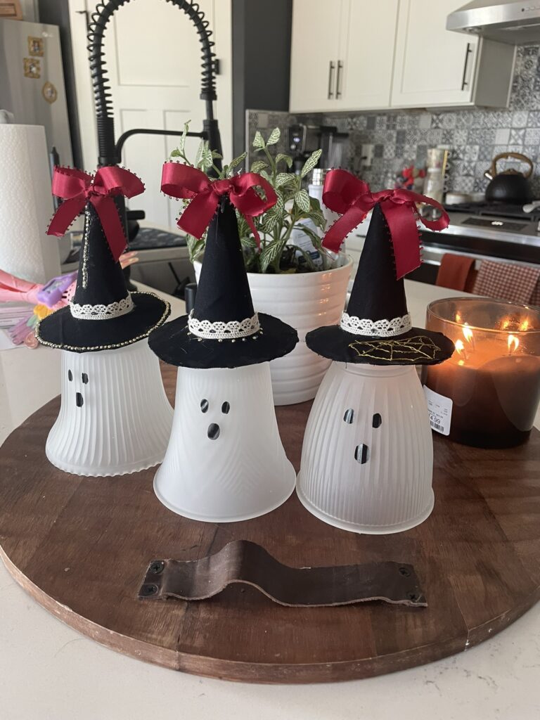 Learn how to make the  viral ghost sconce in this simple tutorial