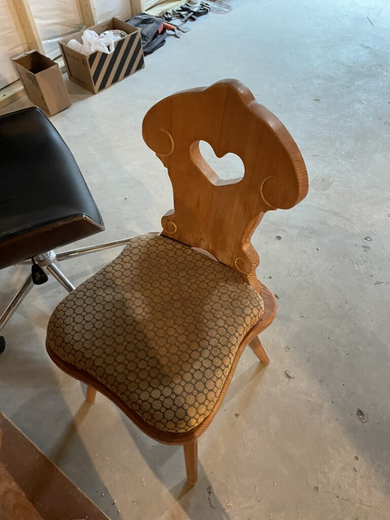 The german dining room table chair before refinishing