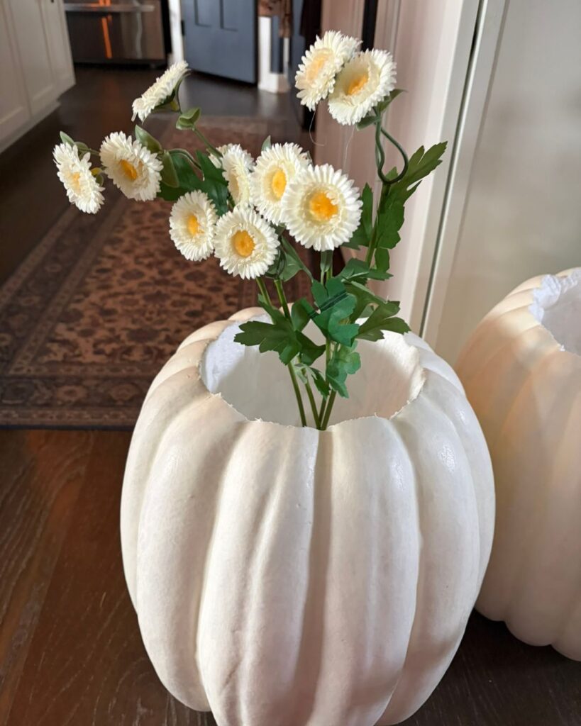 Making foam fake pumpkins into a planter for fall front porch decor